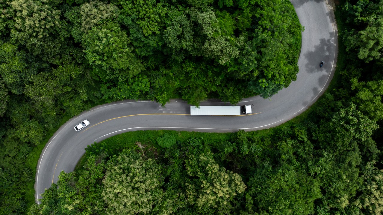 Commercial truck on the highway representing FMCSA carrier safety ratings and compliance review