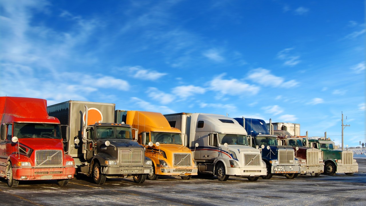 Commercial truck and compliance calendar showing DOT and FMCSA deadlines for 2026